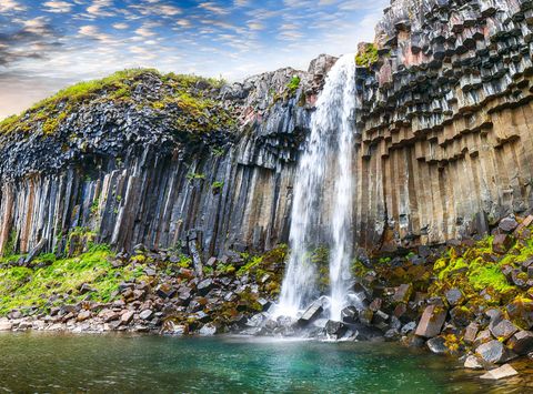 iceland svartifoss tumbling from basalt cliff istk