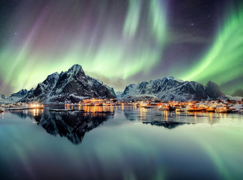 norway lofoten aurora over mountains reine istk