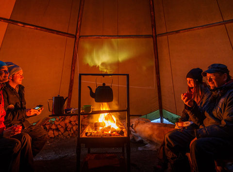 swedish lapland icehotel wilderness dinner inside lavvu rth