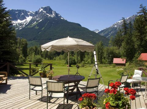 tweedsmuir park lodge mountain view from deck tpl