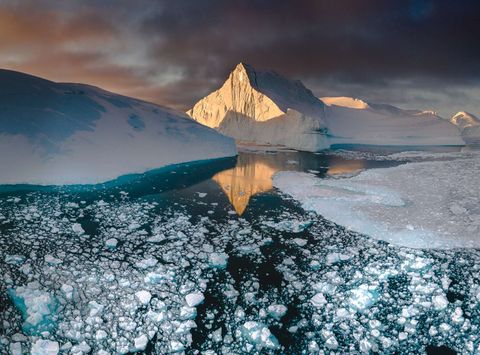 west greenland ilulissat light reflected on icebergs vg