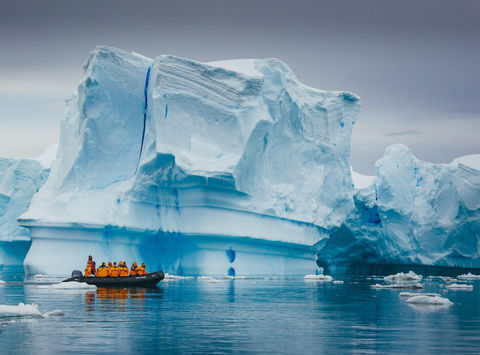 A group on a Zodiac cruise passed a spectacular iceberg in Antarctica