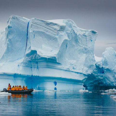 A group on a Zodiac cruise passed a spectacular iceberg in Antarctica