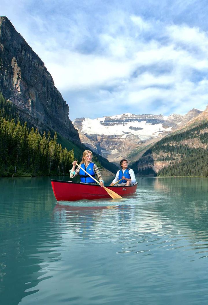 alberta fairmont chateau lake louise hotel canoeing couple