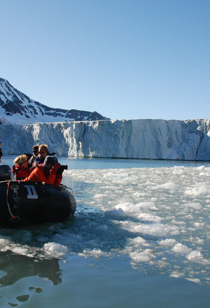 arctic spitsbergen zodiac group at glacier front rp