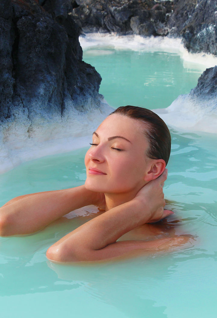 iceland south west blue lagoon woman relaxing istk