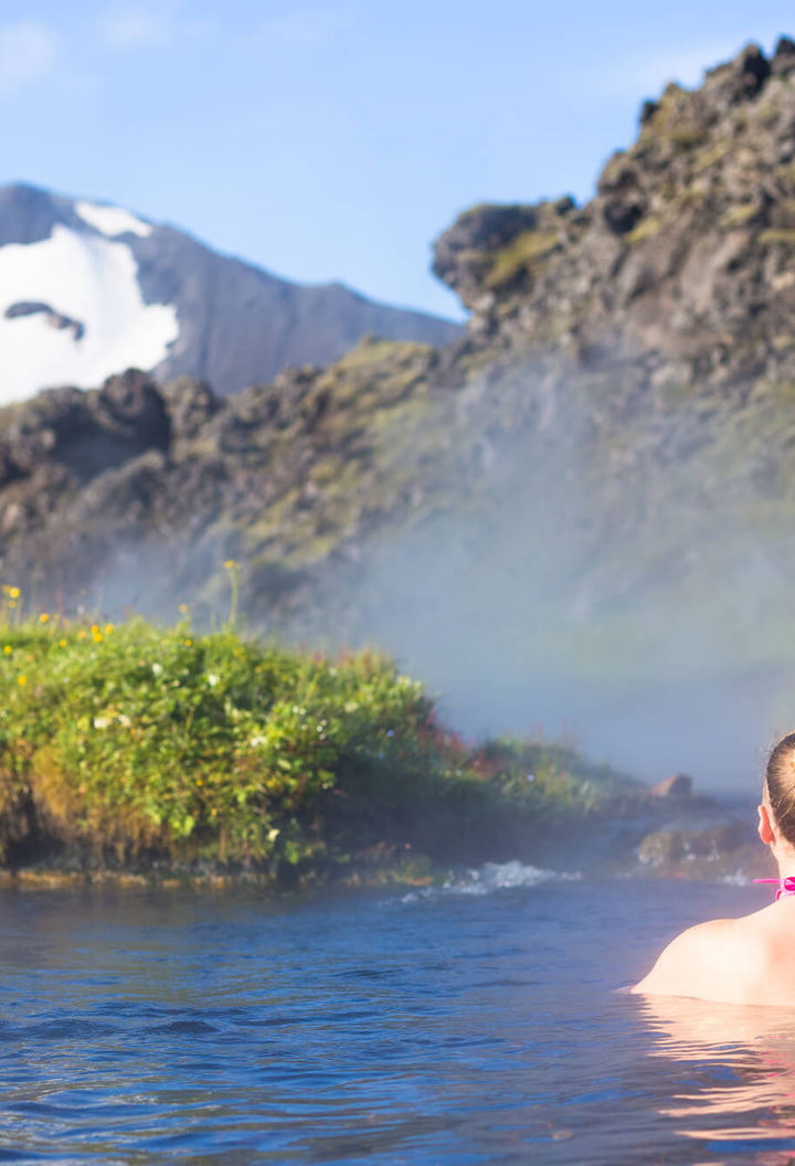 iceland woman relaxing in hot springs landmannalaugar astk