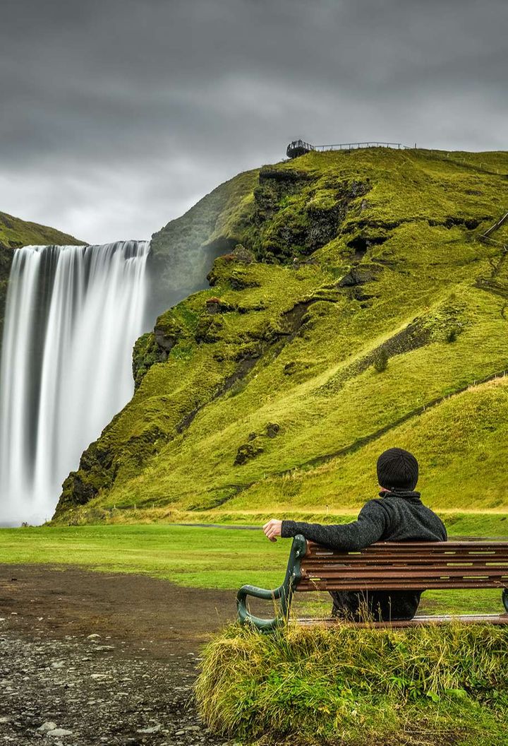 south iceland taking in the view at skogafoss istk