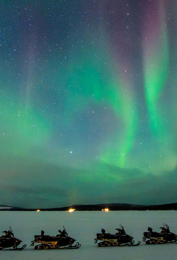 swedish lapland icehotel northern lights by snowmobile