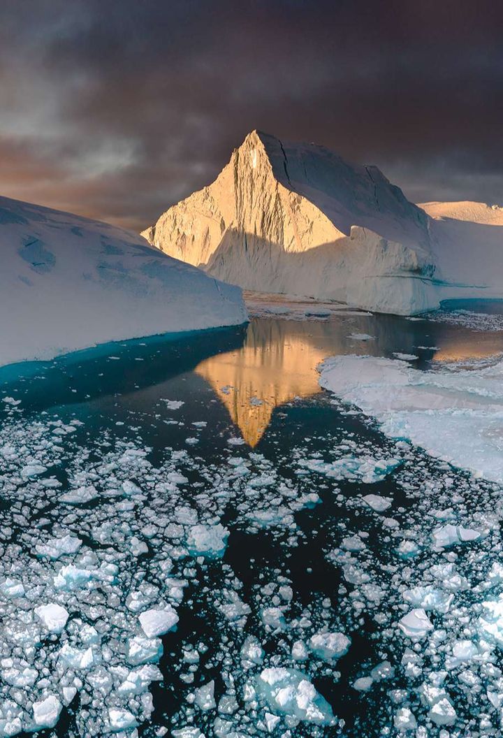 west greenland ilulissat light reflected on icebergs vg