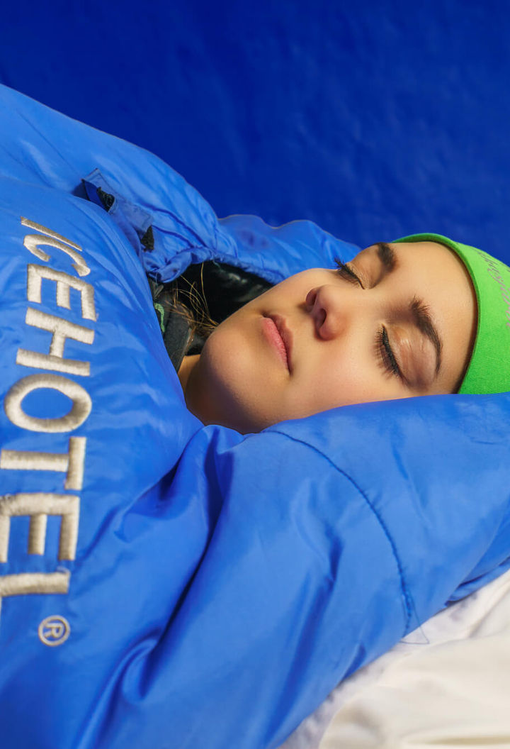 sweden-icehotel-sleeping-on-ice-in-sleeping-bag-rth