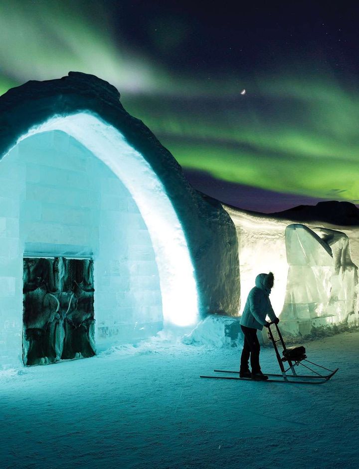 northern lights over the icehotel in Swedish Lapland