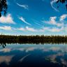 east finland clouds reflected in lake jarvimaisema hk